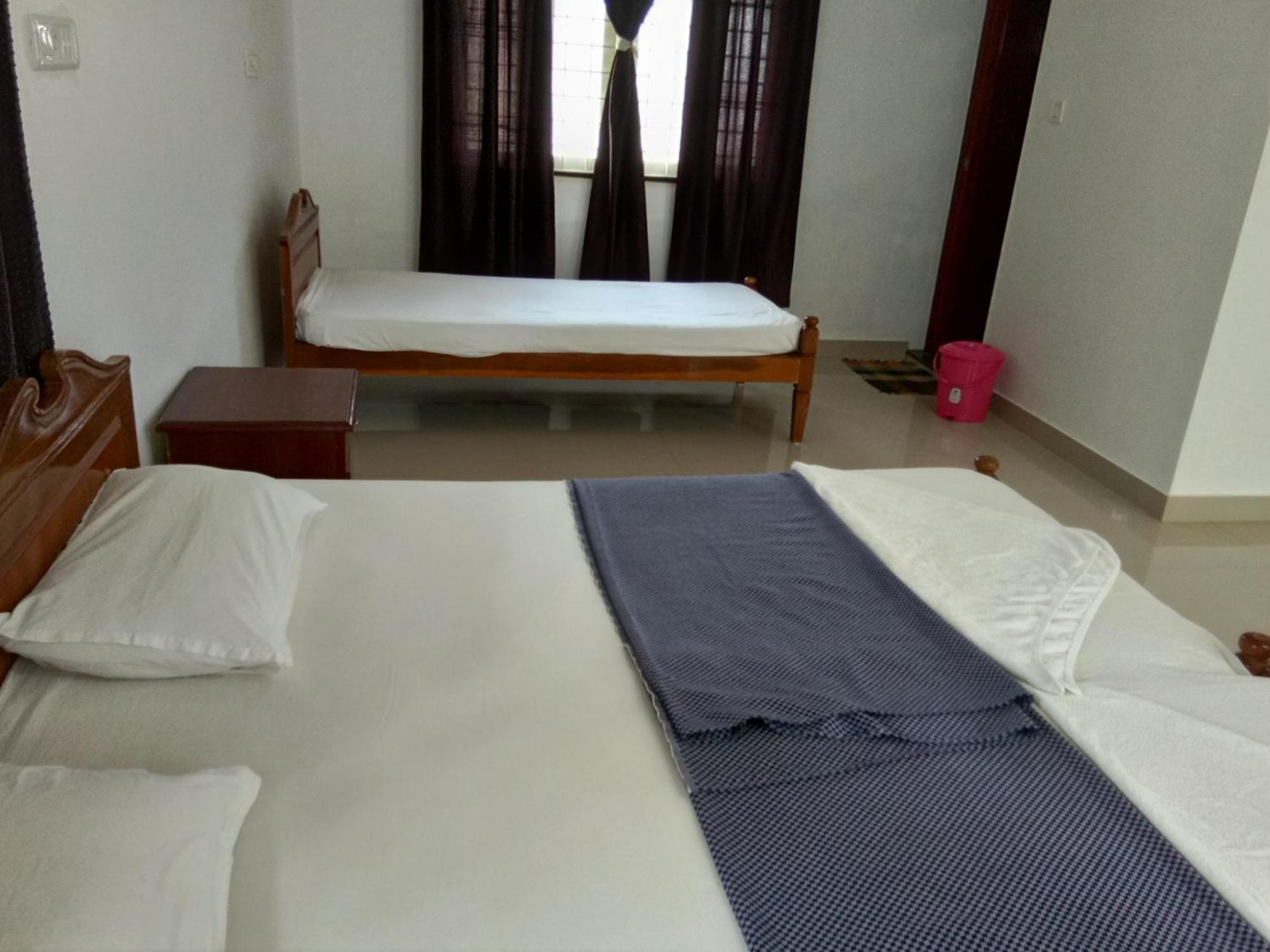 Coconut Grove Apartamento Kochi Quarto foto